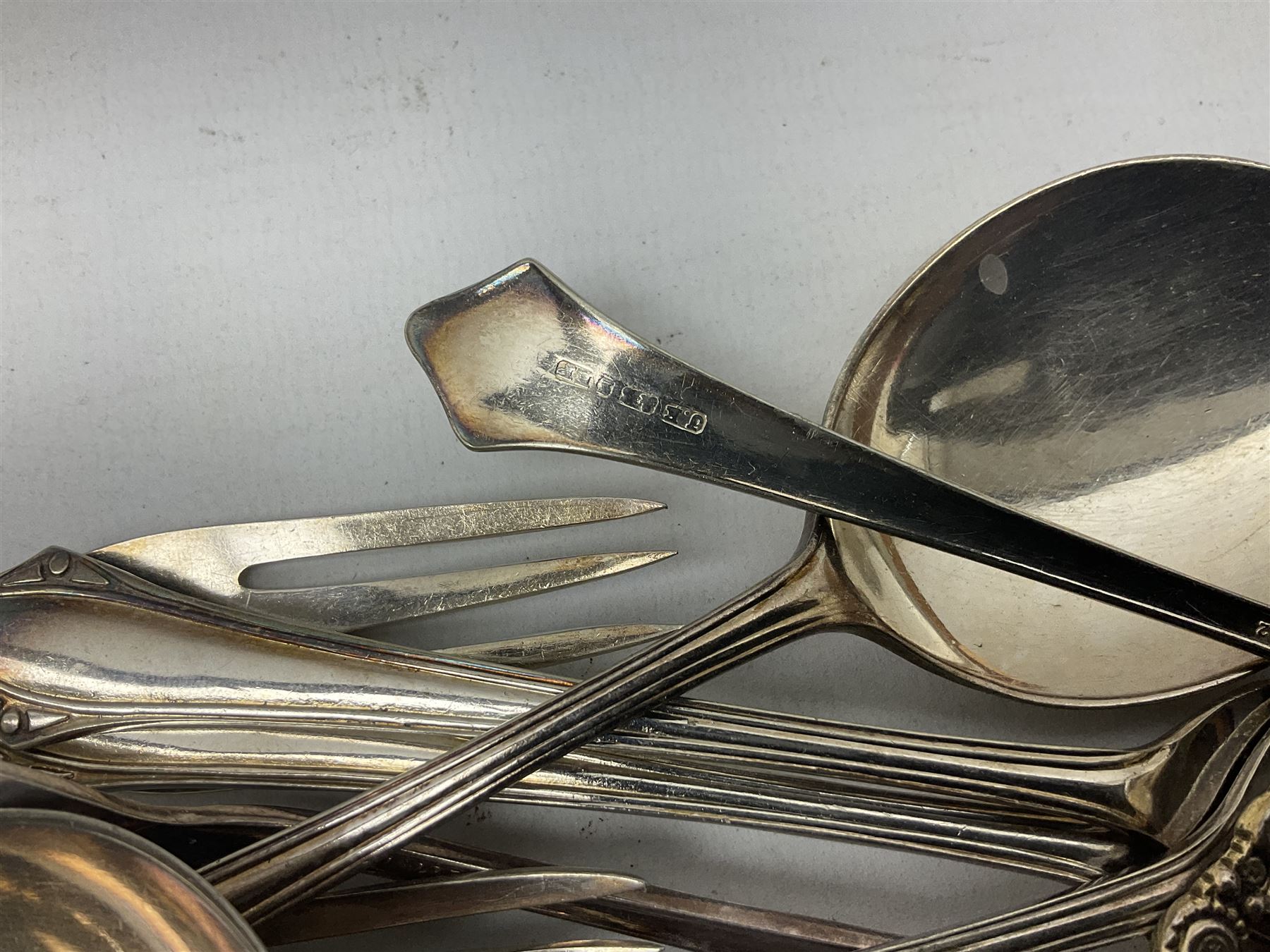Group of silver to include cased set of six silver handled knives hallmarked Birmingham 1921 by Raeno Silver Plate Co, three hallmarked napkin rings etc together with silver plated and other metalware etc