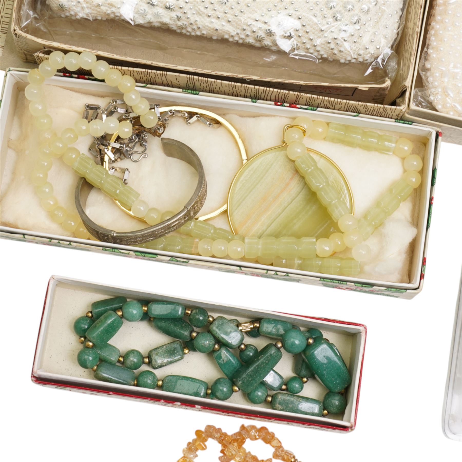 Silver jewellery, including Baltic amber cross pendant, locket, chains and ring, together with Raymond Weil wristwatch, imitation pearl necklace and a collection of costume jewellery including bead necklaces