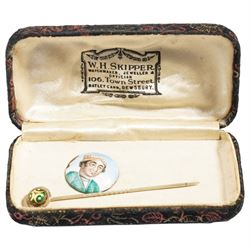Qajar period enamel plaque depicting a portrait of a young man, D2.1cm, together with a 19...