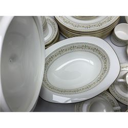 Royal Doulton Paisley pattern tea and dinner service for twelve, comprising dinner plates, side plates, soup bowls, dessert bowls, tea plates, two lidded tureens, sauce boat and saucer, sucrier and jug, oval serving dish and teacups and saucers