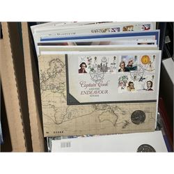 Approximately one hundred and fifteen Royal Mint coin covers, in two ring binder folders and loose, together with approximately 53 grams of Great British pre-1920 and approximately 68 grams of Great British pre-1947 silver threepence coins, and a small quantity of further pre-decimal coins