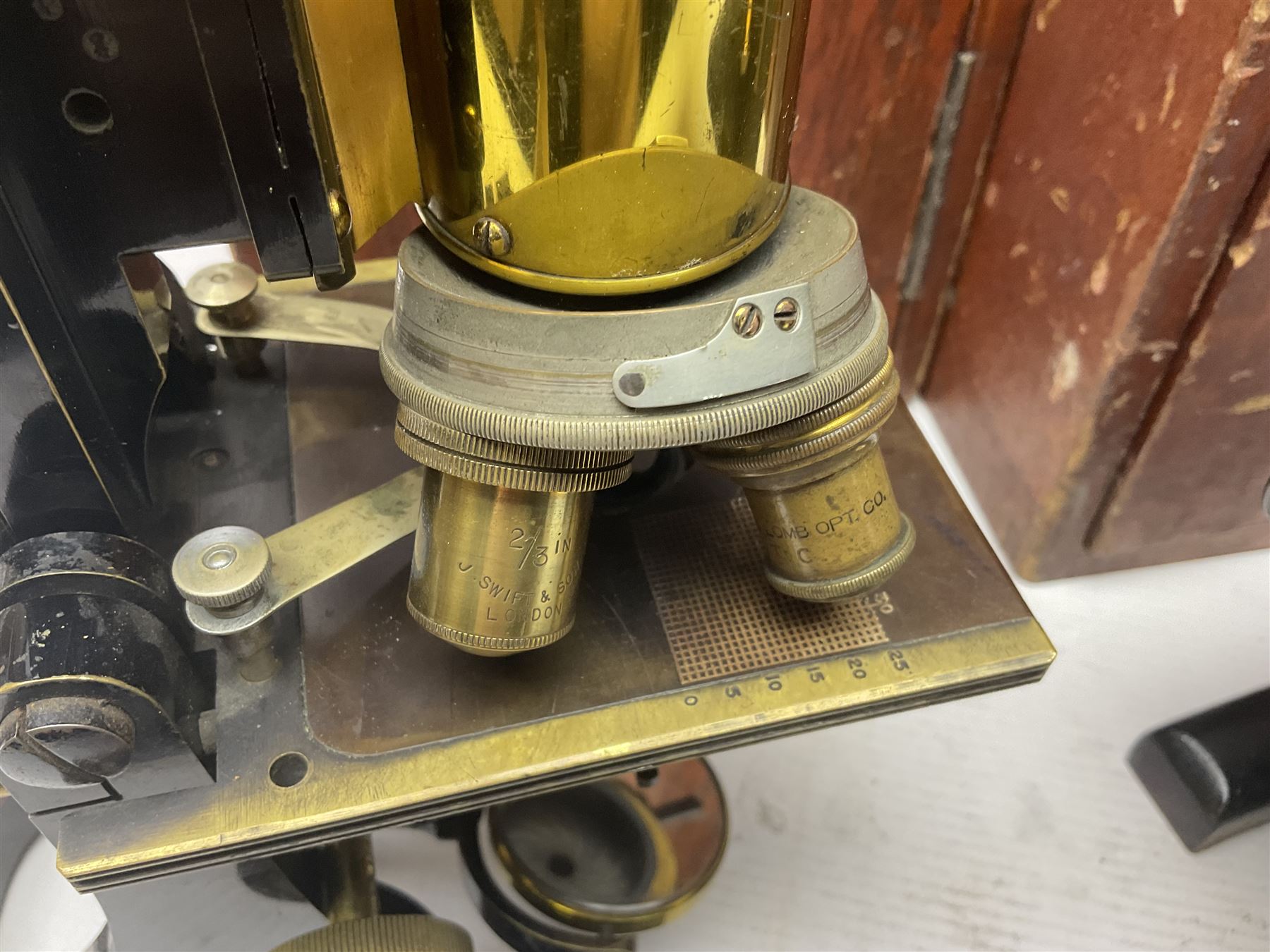 Three boxed microscopes, comprising Hawkslay & Sons Spencer Buffalo microscope no 68177, J Swift & Son microscope and R & J Back microscope no 30241