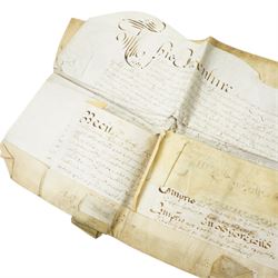 George III surrender of a tenancy in the Manor of Liddington in the county of Rutland, surrender of a tenancy on the same estate 1799 and two other indentures concerning the same estate; William and Mary indenture 1691,  Queen Anne indenture between John Waldrom of Oadby and George Durnor, mortgage document and other indentures