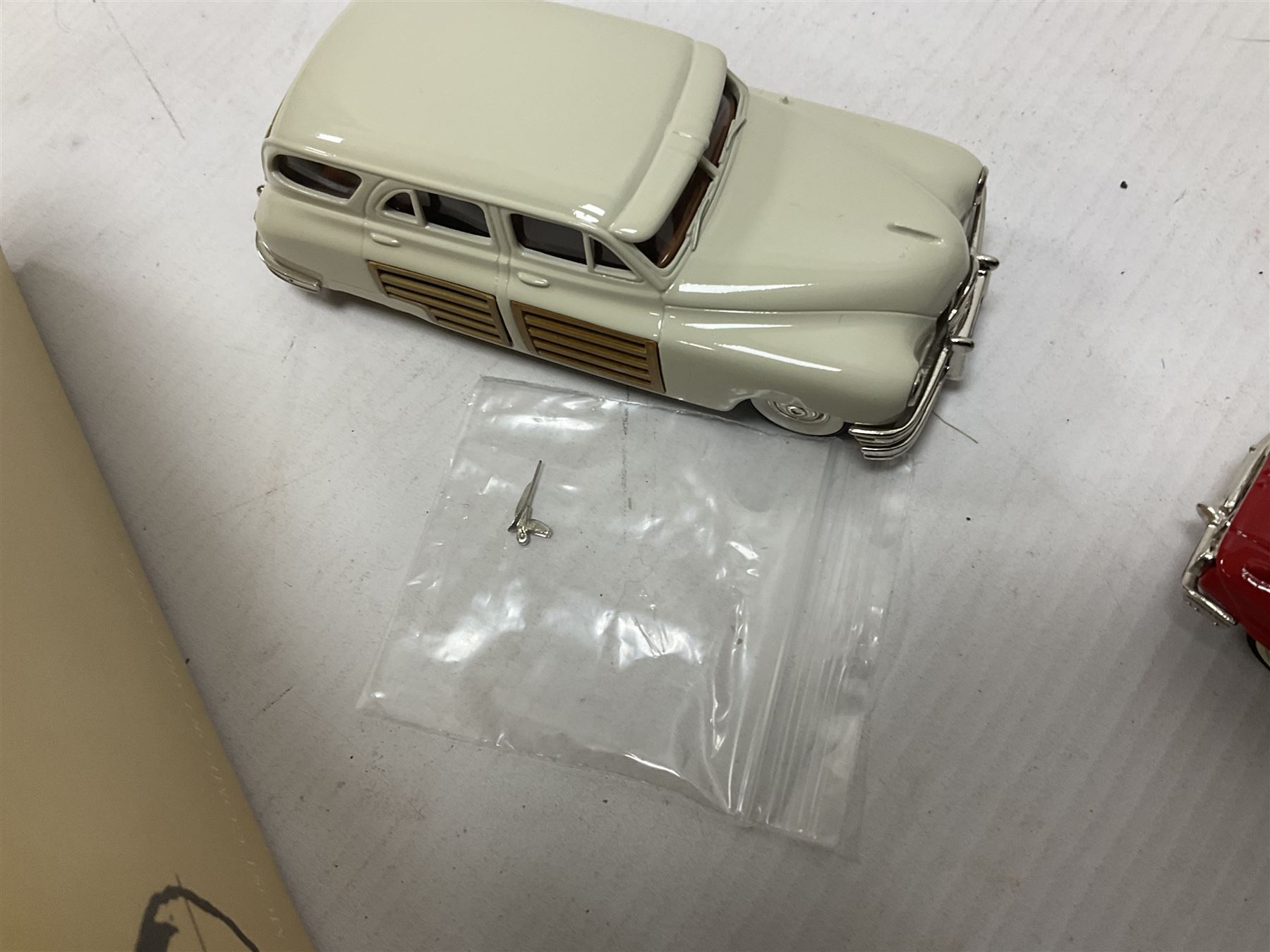 Brooklin Models - three 1:43 scale heavy die-cast model cars comprising BRK31 WMTC 1953 Pontiac Sedan Delivery in maroon with tan interior; BRK43 1948 Packard Station Sedan; BRK44 1961 Chevrolet Impala Sport Coupe; all boxed (3) 