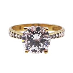 9ct gold cubic zirconia solitaire ring with stone set shoulders, hallmarked 