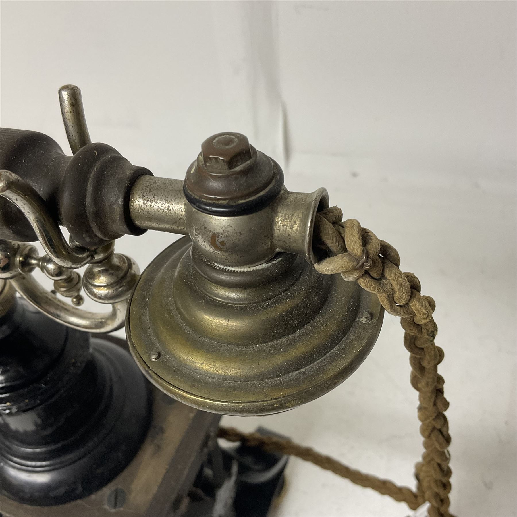 Early 20th century Skeleton Type telephone, probably made by Ericsson, marked MR No. 16, with headset, H30cm