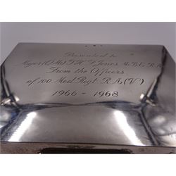 Modern silver mounted cigarette box, of plain rectangular form, with personal engraving to hinged cover, opening to reveal soft wood lined interior, H3.8cm, W21.5cm, hallmarked Padgett & Braham Ltd, London 1967, together with a silver cigarette case, with engraved C scroll decoration, hallmarked Joseph Gloster Ltd, Birmingham 1917 or 1942 and a silver souvenir spoon