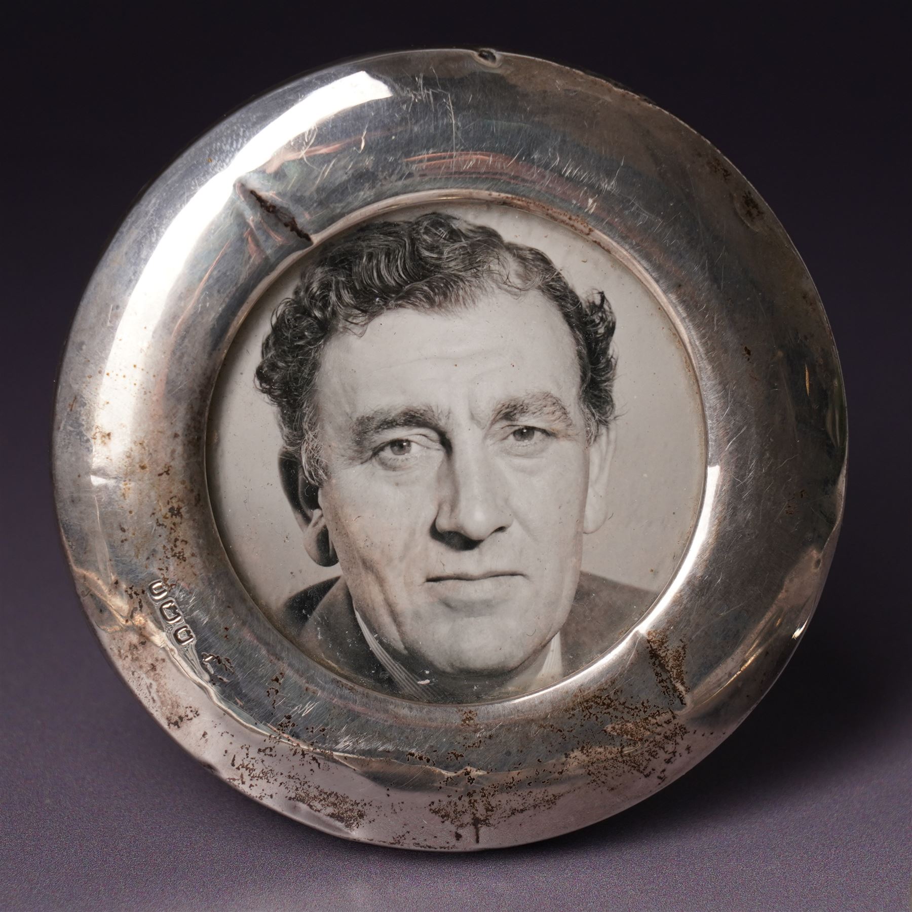 Small silver photograph frame,  four decorative silver forks, two silver and enamel spoons, other silver spoons and silver cased fob watch 