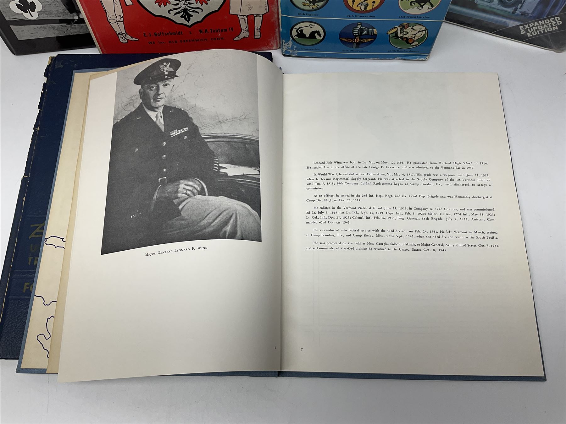 Four reference books of US Military interest comprising Basic Training US Army Training Center Infantry Fort Jackson, South Carolina; two books on the 43rd Infantry Division; and WW2 Combat Squadrons of the USAF; and three other books including German Army & Navy Uniforms and Insignia 1871-1918 (7)
