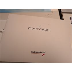 Collection of Concorde memorabilia, including paperweight, limited edition print, calendars, scale model, etc 