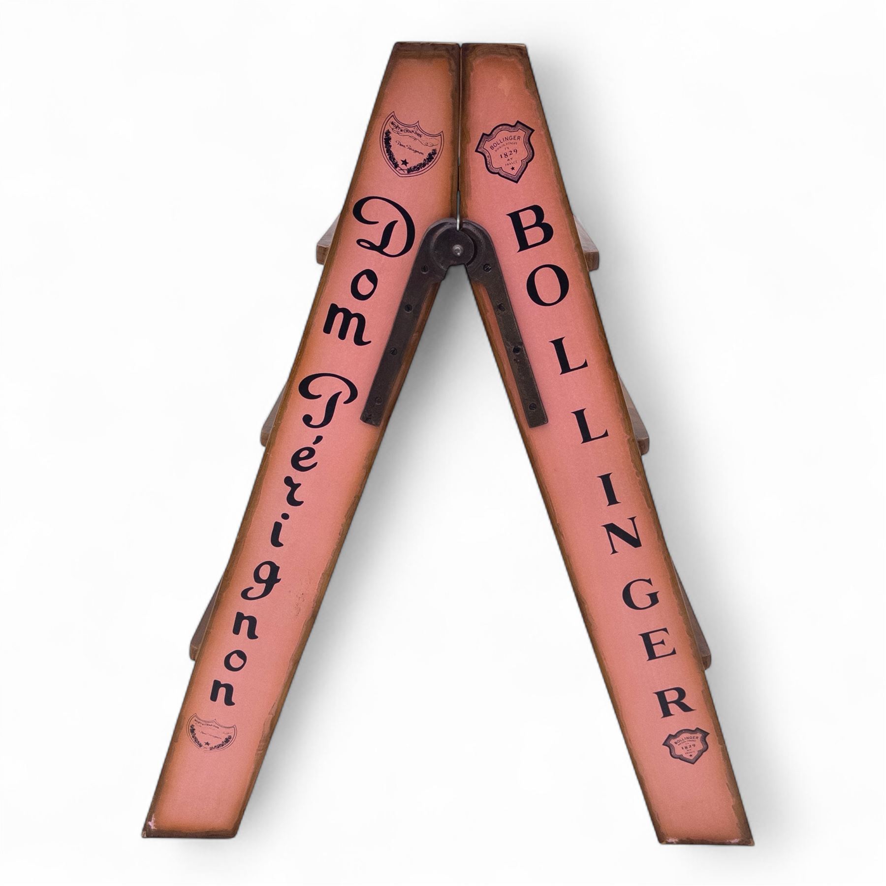 Three-piece champagne advertising display set, comprising pine steps with painted Dom Pérignon and Bollinger lettering, and two wooden boxes branded Moët & Chandon and Veuve Clicquot (Steps H 80cm, W 44cm, D 68cm, crates each H 18cm, W 44cm, D 26cm)