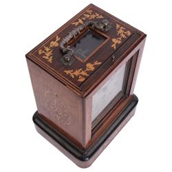 Henry Marc of Paris -  mid 19th century 8-day Pendule d'officier campaign clock in a rosewood veneered case with contrasting floral and leaf inlay and ebonised moulding, rectangular case with a brass carrying handle and sliding glass panel to the silvered sheet dial, chapter ring with Roman numerals, minute track and steel trefoil hands, with a single train timepiece movement and silk suspension. With pendulum and key. 