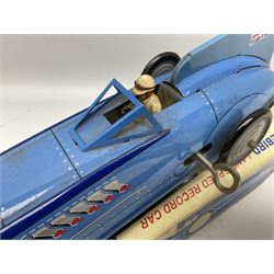 Schylling Collector Series clockwork tin-plate Sir Ian's Bluebird Land Speed Record Car with key and paperwork No.006080; boxed; and clockwork silvered tin-plate model of an 0-6-0 locomotive; unboxed (2)
