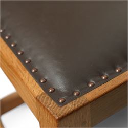 Mouseman - set of six oak dining chairs, pierced and carved lattice back over leather upholstered seat, on octagonal front supports united by stretchers, carved with mouse signature, by the workshop of Robert Thompson, Kilburn 