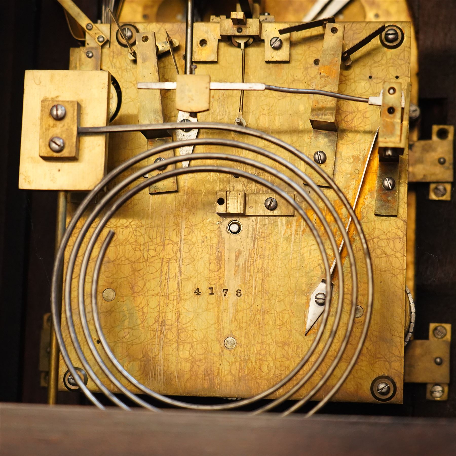 Late 19th century bracket clock with three train movement, Westminster Chimes on eight bells and gong strike, the brass dial inscribed 'Webber Liverpool' with gilt brass mounts in mahogany dome top case with pineapple finial, brass handles and classical columns on compressed circular feet H76cm