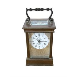 French -  brass cased 20th century  8-day timepiece carriage clock, dial inscribed L' Epee Fondee-En 1839, Sainte Suxanne, France, with a circular enamel dial and an embossed brass dial mask, Roman numerals, minute markers, five minute Arabic's and steel moon hands, with a jewelled lever platform escapement.