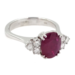 18ct gold oval ruby and six round brilliant cut diamond ring, hallmarked, ruby approx 1.60 carat