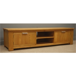  Light oak television stand, centre shelves flanked by two cupboards, stile end supports, W180cm, H46cm, D51cm  