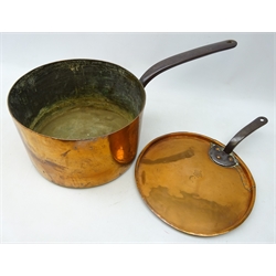  Large Victorian copper saucepan with lid, stamped with Coronet over C, cast iron handles, L62cm, H23cm (2)  
