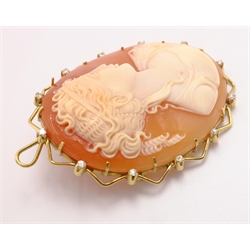  Cameo brooch in 18ct gold surround set with twelve diamonds, stamped 750 length 5cm  