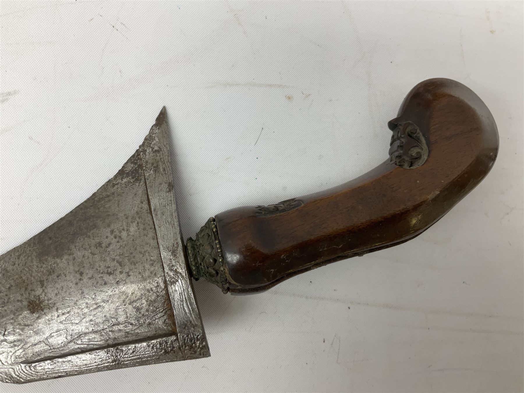 Malayan Kris dagger, the 31.5cm double edged straight heavy damascus blade with copper ferrule; carved hardwood grip; in large wooden throated scabbard with floral decorated white metal covering L47.5cm overall; a kris blade with adapted antler grip; and five various small daggers/letter openers (7)