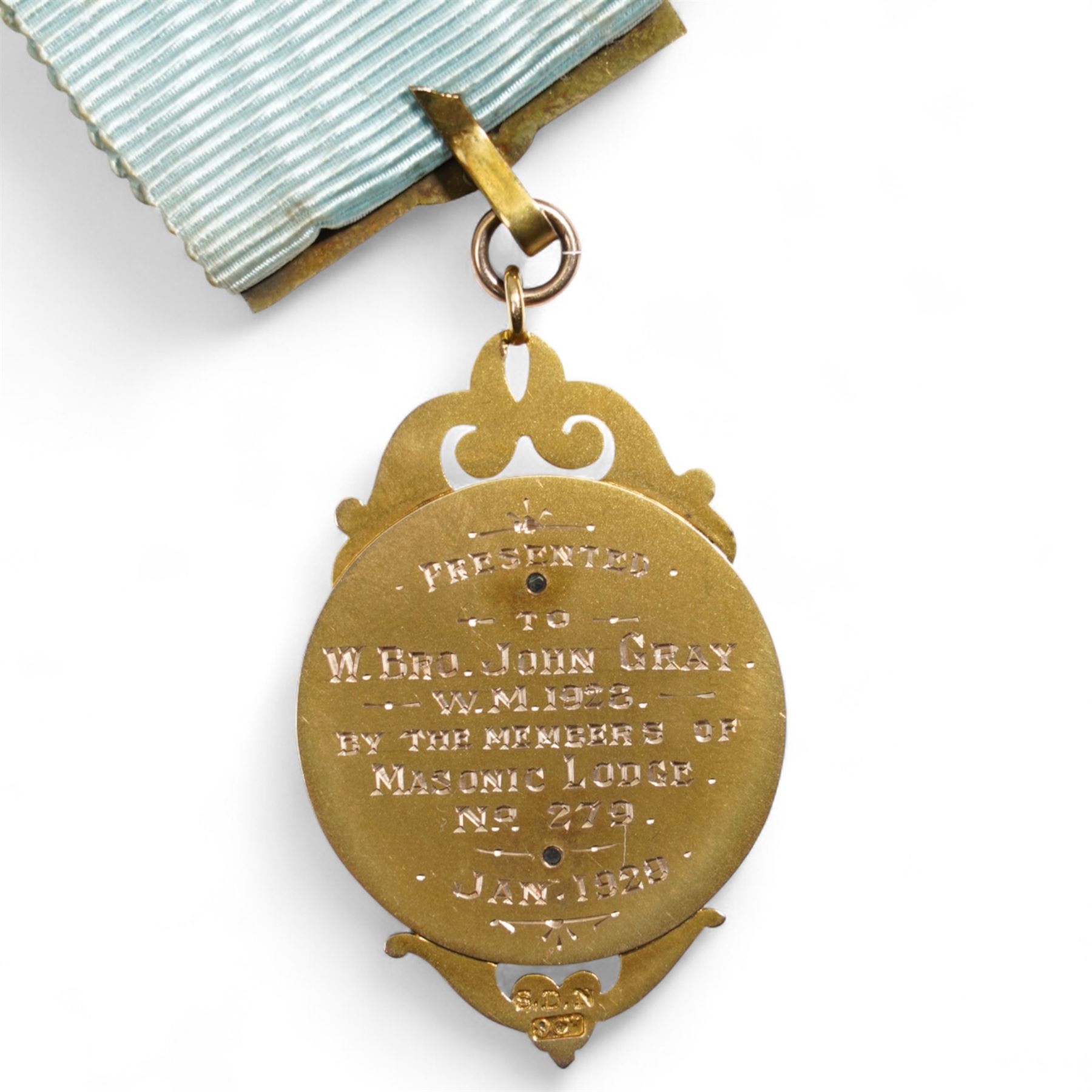 Early 20th century gold presentation Masonic jewel,  'Ashley Masonic Lodge 279', stamped 9ct, with applied silver emblem, on gilt mounted ribbon, the reverse with inscription 'Presented to John Gray 1929'