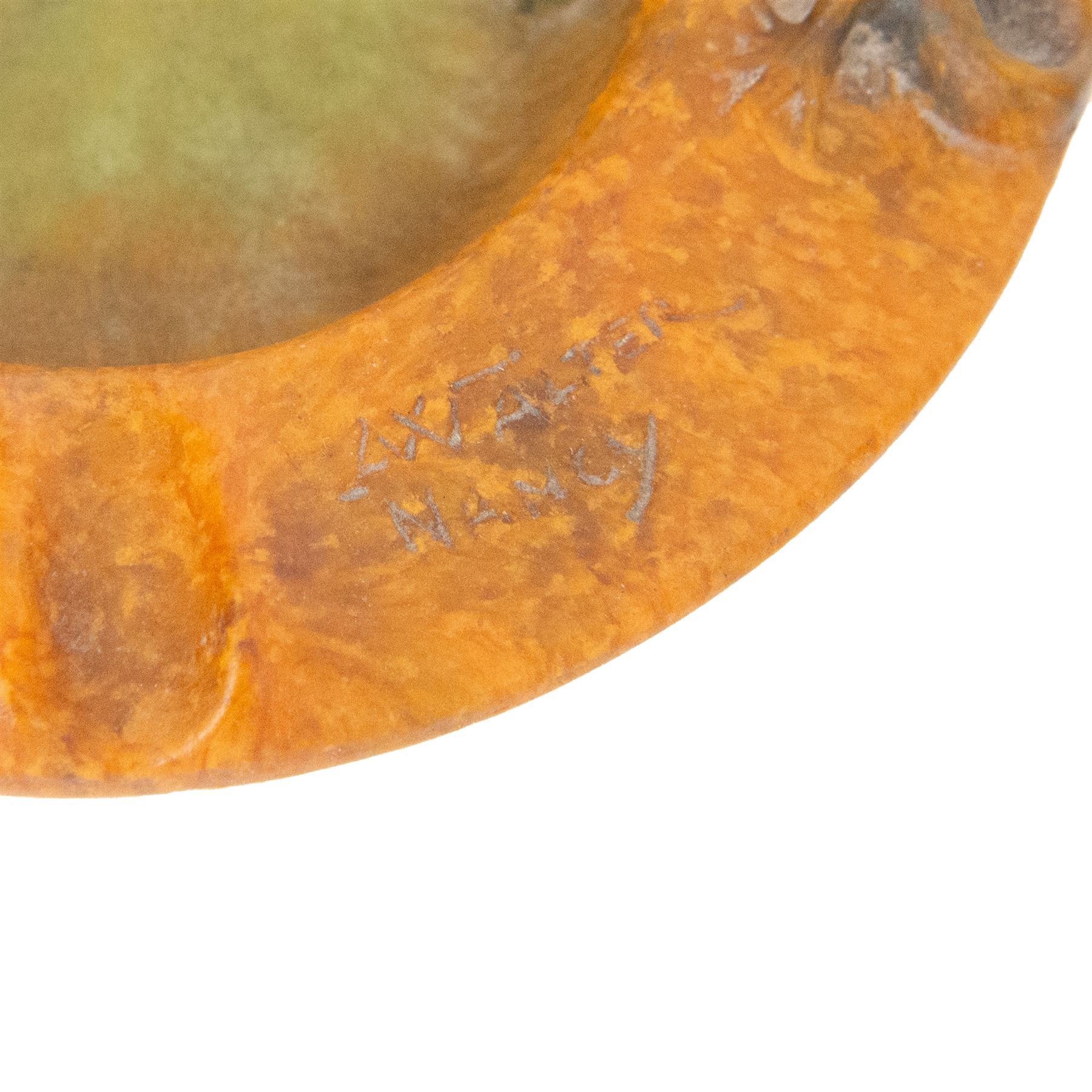 Amalric Walter (1870-1959) and Henri Berge (1868-1936), Nancy, France, circa 1920, pate de verre, Salamander ashtray, bearing moulded mark 'A Walter Nancy' and incised mark 'Berge sc.', D12cm

Note: Almaric Walter, born in Sèvres near Paris, exhibited at the Salon des Artistes Françaises in 1895 and 1903, and in 1908 moved to Nancy where he established his own workshop within the Daum glassworks. There he worked closely with Daum designers, including Henri Bergé. This ashtray is an example of Walter’s pâte-de-verre technique.

Provenance: From the collection of Andrew Chichester Everitt.