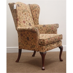  Original Parker Knoll wingback armchair, upholstered in a floral fabric, cabriole supports, W75cm  