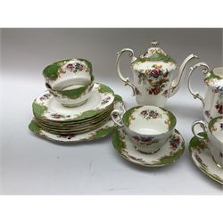 Paragon Rockingham pattern tea set, comprising teapot, coffee pot, four teacups and four saucers, six side plates, six dessert plates, cake plate, two open sucriers, and jug. 