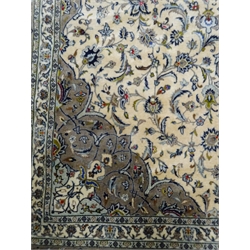  Kashan beige ground rug, central medallion on floral field, 320cm x 210cm  