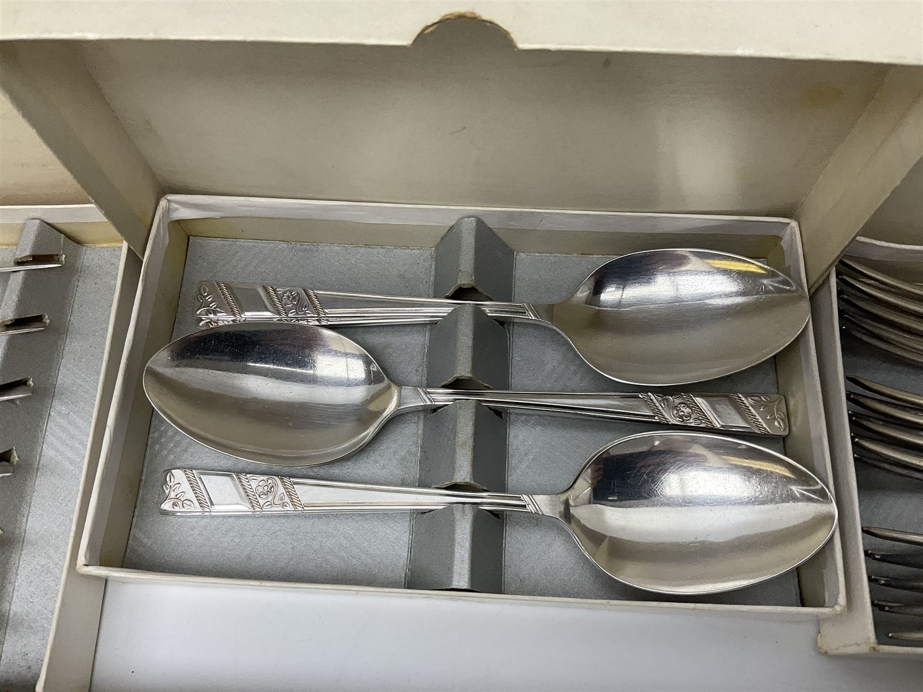 Viners Ltd silver plate Silver Rose pattern cutlery service for six place settings, to include butter knives, table knives and forks, soup spoons, dessert forks and spoons, tea knives, forks and spoons, two serving spoons and a seven piece fruit set, some boxed, missing table spoons