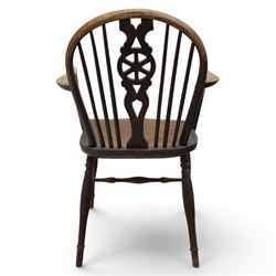 Late 19th century elm and ash low-back Windsor chair, swept arms raised on turned supports  united by H-stretcher