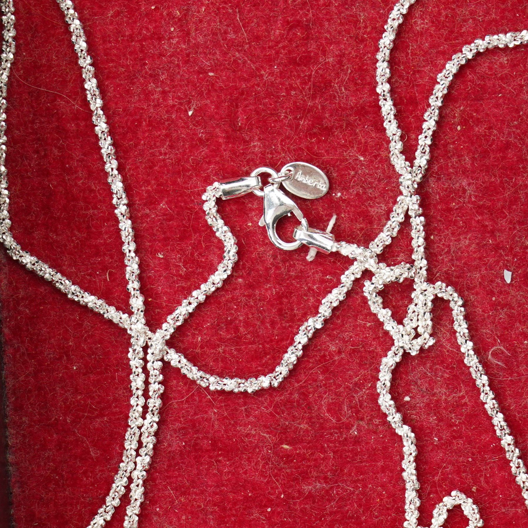 9ct gold jewellery, including fan charm, necklace chain, two pairs of earrings, silver jewellery, including necklace chains, earrings, rings, etc