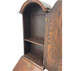 Small early 20th century Queen Anne style bookcase on bureau secretaire, the moulded arched pediment over mirrored door in shaped frame, the bureau fitted with fall front enclosing curved fitted interior, cushion moulded drawer over single drawer, on scroll and shell carved cabriole supports