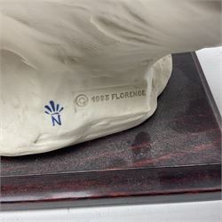 Giuseppe Armani Florence figure, Black Maternity, modelled as a mother and child upon a stylised cloud and mahogany base, H32cm