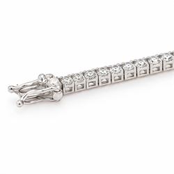18ct white gold diamond line bracelet, set with seventy-six round brilliant cut diamonds, stamped, total diamond weight approx 2.30 carat