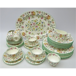  Minton Haddon Hall dinner and tea service comprising eight dinner plates, eight soup bowls, eight tea plates, seven cups & saucers, milk jug, sugar bowl and oval platter   