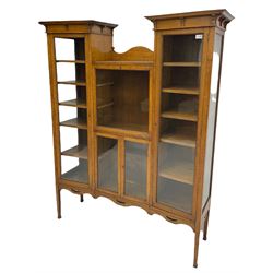 Early 20th century oak drop centre display cabinet, enclosed by glazed doors 