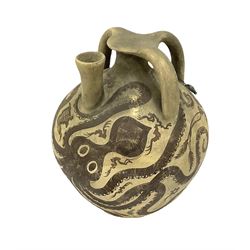 Reproduction Ancient Greek vessel in the style of Crete Minoan period, decorated with marine style ocotopi, with three handles and spout, signed beneath, H20cm