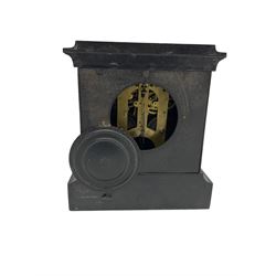American slate/metal cased mantle clock c1890 with a spring driven eight-day striking movement striking the hours on a gong, case with recessed reeded columns with Corinthian capitals, ivorine dial with Roman numerals and a gilt repoussé centre, flat glass within a spun bezel with egg and dart decoration. With pendulum.

