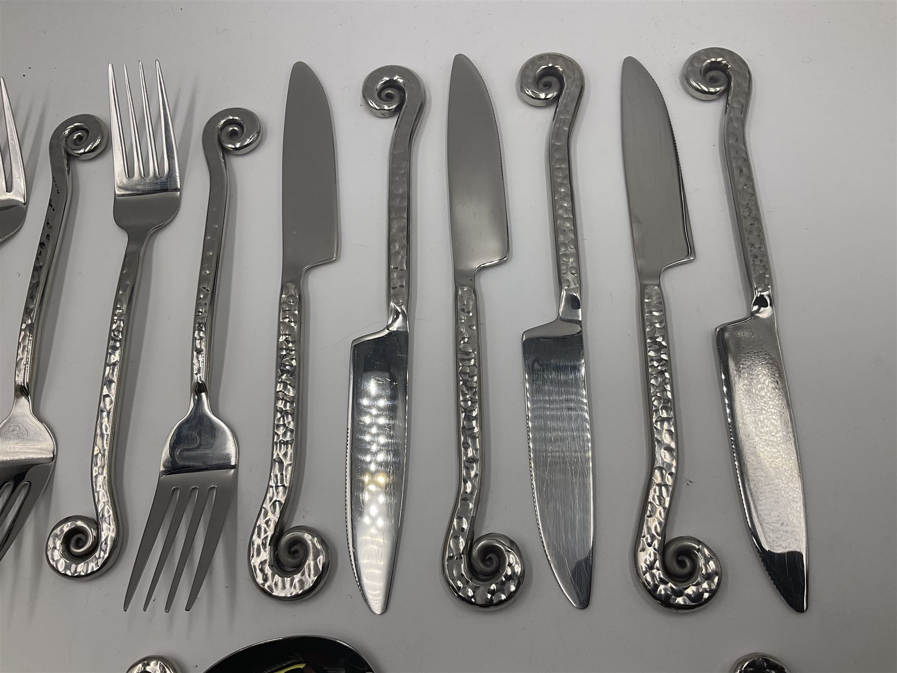 Artisan 24 piece stainless steel cutlery set in the Hammered Shell pattern