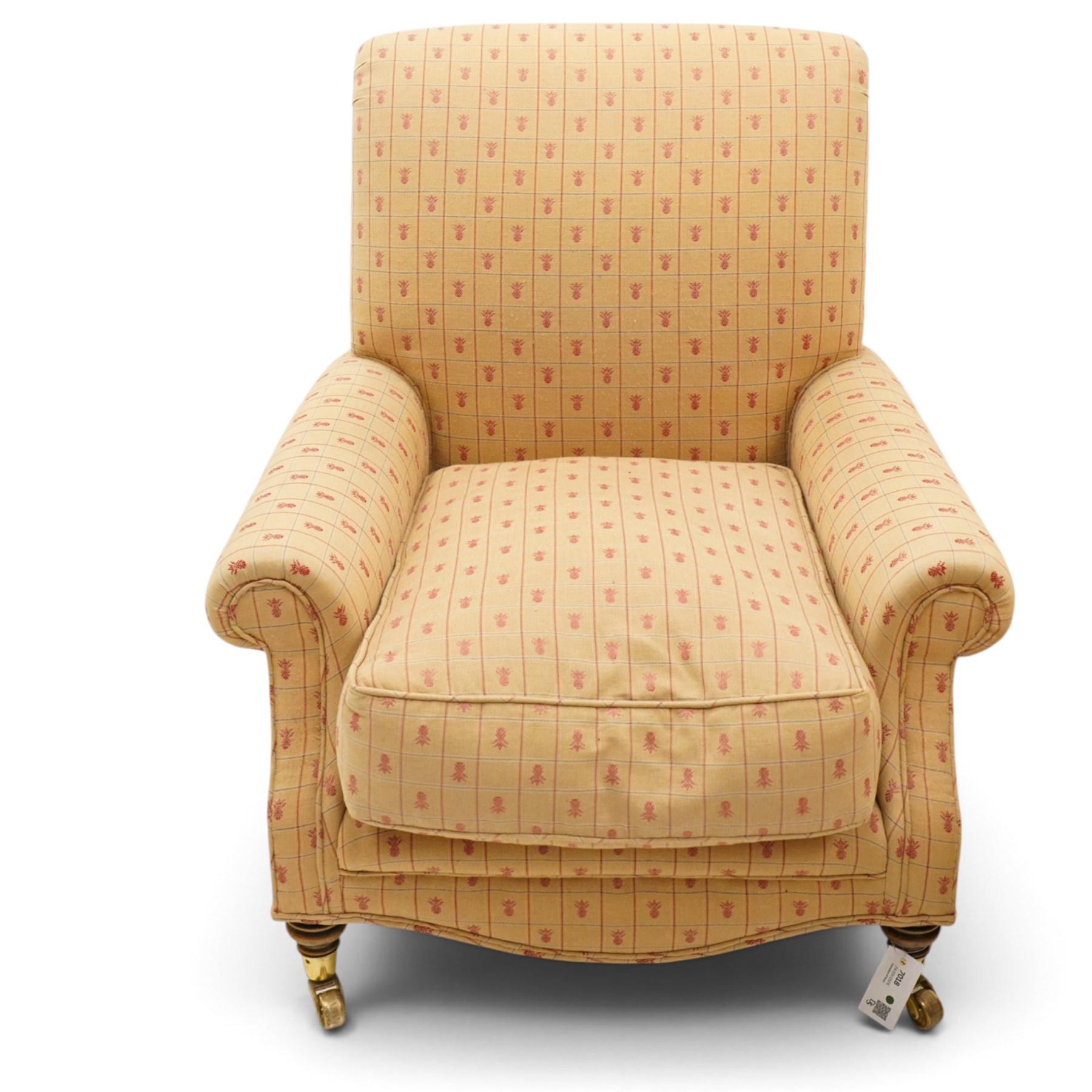 Pair of Victorian style armchairs of traditional shape, high rolled and sprung back over rolled arms, upholstered in chequered fabric with pineapple motifs with loose seat cushion, on turned feet with brass castors