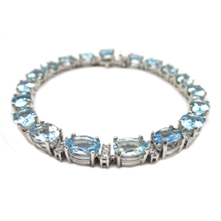  18ct white gold aquamarine and diamond bracelet, stamped 750, aquamarine 12.0 carat, diamond total weight 1.3 carat  