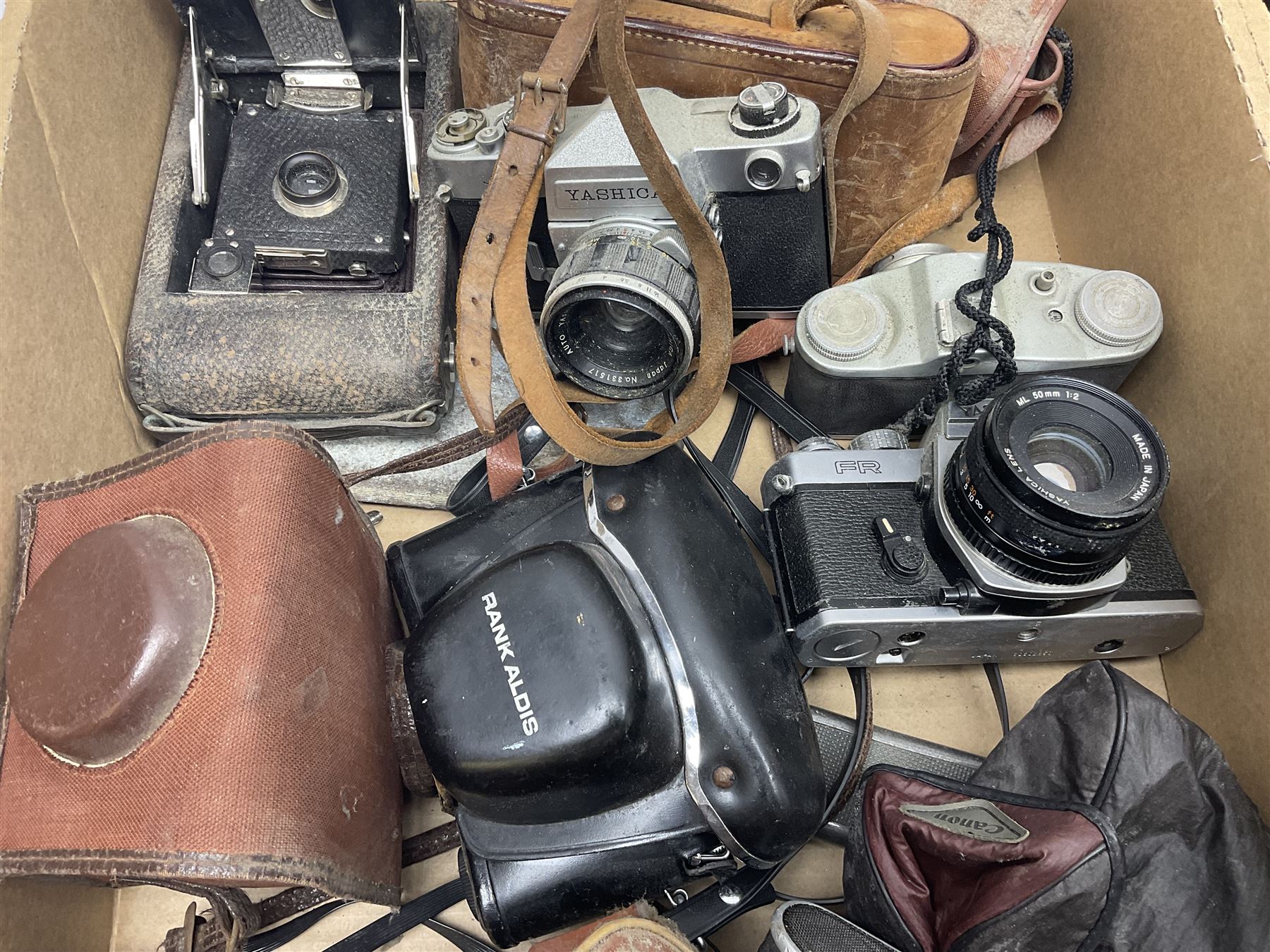 Large collection of cameras to include folding and SLR examples, including Rank Aldis, Agfa, Yashica, etc