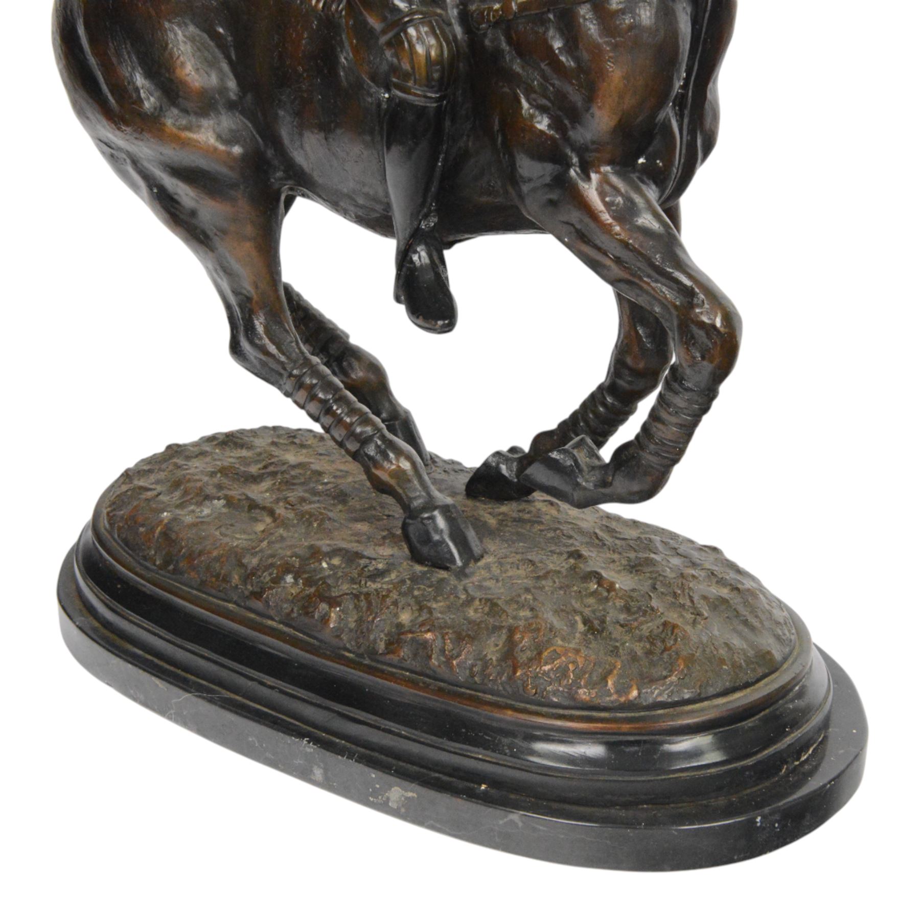 20th century spelter figure of a mounted polo player, upon a marble base, H60cm