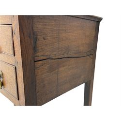 18th century Welsh oak lowboy, fitted with long drawer above three small drawers, square tapering supports, with fan carved corner brackets, circular plate and drop handles 