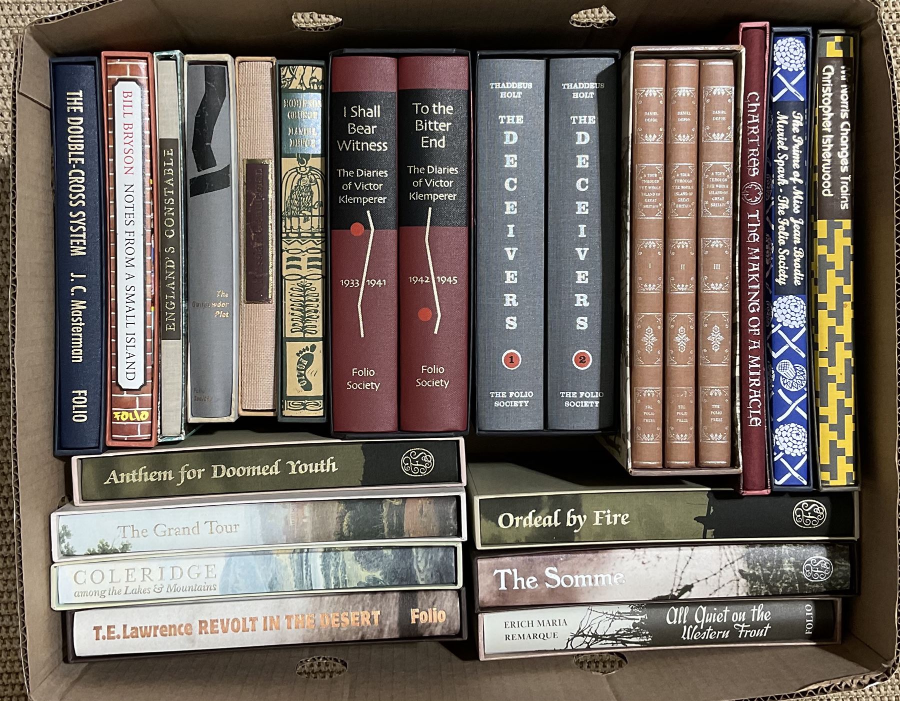 Folio Society - twenty-three volumes including The Diaries of Victor Klemperer, two volumes; The Deceivers, two volumes; A Tour Through the Whole Island of Great Britain, three volumes; The Grand Tour; The Somme; Ordeal by Fire; Coleridge; Revolt in the Desert etc; all in slip cases