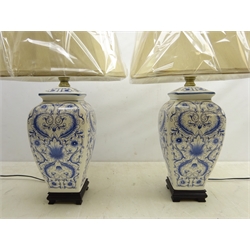  Pair Oriental style blue and white table lamps on ebonised base with shades, H36cm   