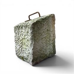 19th century carved tethering stone, square sloping form with iron work loop