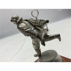 Walker & Hall silver plated RAF mess cruet frame H16.5cm; after Chas C. Stadden, a presentation pewter figure of a WW2 RAF fighter pilot in a Battle of Britain 'Scramble' pose bearing RAF Marham plaque; and a limited edition figure after David Thatcher of a wounded soldier loading his gun No.2/25 (3)